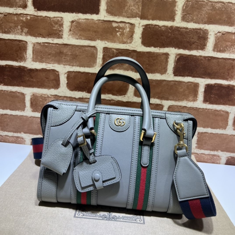 G*u*i shopping bags